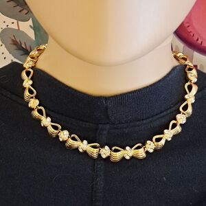 Nina Ricci Elegant Gold Bow and Crystal Necklace